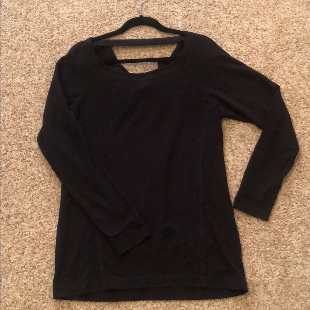 A black shirt with a drop back